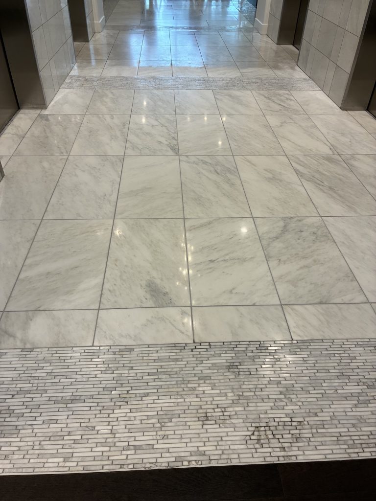 Marble entry flooring at Aspire Post Oak in Uptown Houston